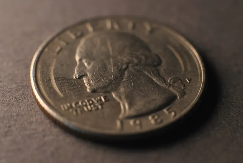 A close up of a coin on a table